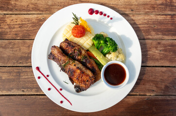 Plate of Pork Chops and Vegetable