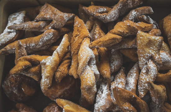 Image of sugared pastries called faworki in polish during fat thursday.
