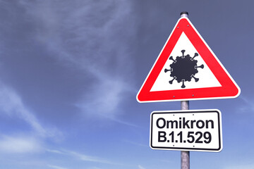 Verkehrsschild - Achtung - Coronavirus - Omikron - Himmel - Wolken