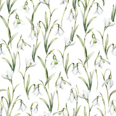 Seamless pattern with delicate flowers of snowdrops on an isolated white background. Watercolor botanical flowers for textiles, wrapping paper or your other design.