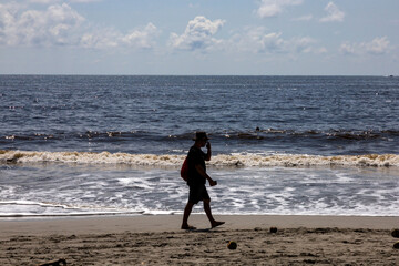 People Silhouettes at the Beach in Costa Rica