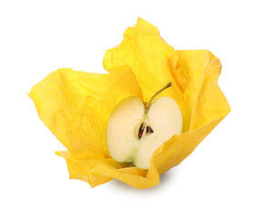 Half of apple in yellow beeswax food wrap on white background