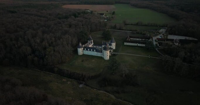 Aerial shot of the castle and stable of the Gu&eacute; P&eacute;an by sunset in Monthou-sur-Cher, next to the Loire Valley, in France.