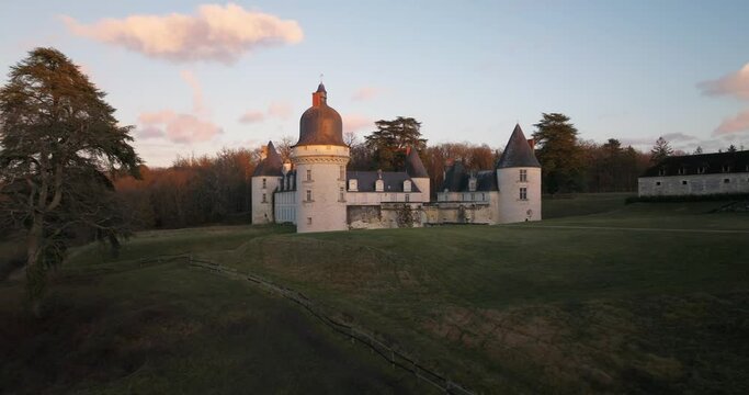 Aerial shot of the castle of the Gu&eacute; P&eacute;an by sunset in Monthou-sur-Cher, next to the Loire Valley, in France.