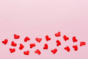 Valentine day background with red hearts, top view with copy space