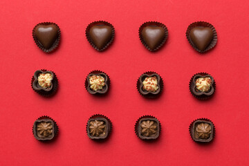 Different kinds of chocolates on colored table close-up. Top View and Flat Lay