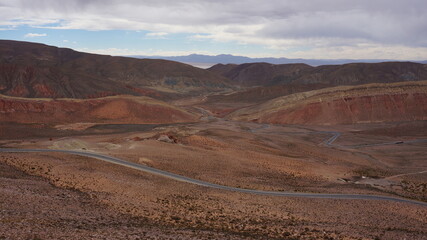 Fototapeta na wymiar road through high altitude landscape in argentina