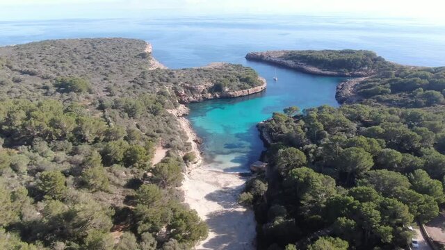 Cala Sa Nau Mallorca beach. Beautiful view of the seacoast of mallorca with an amazing turquoise sea, in the middle of the nature. Concept of summer, travel, relax and enjoy