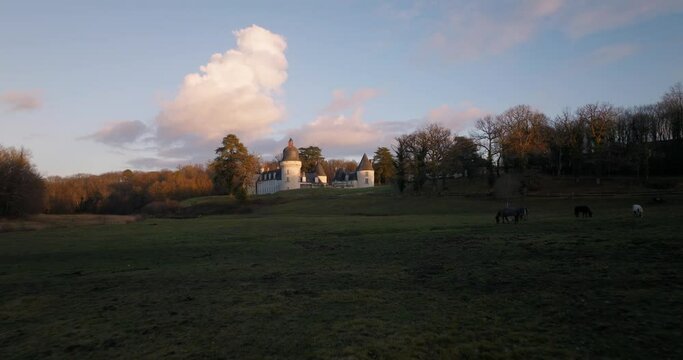 Aerial shot of the castle of the Gu&eacute; P&eacute;an by sunset in Monthou-sur-Cher, next to the Loire Valley, in France.