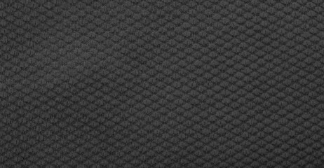 black cotton material with an interesting pattern