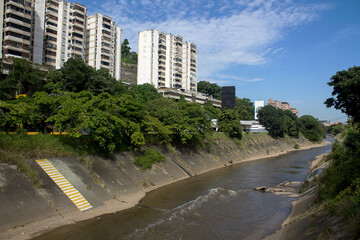 Traveling through the city canals of the Guaire river, its waters are waste and accumulate all the wastes of the industry and the Caracas population