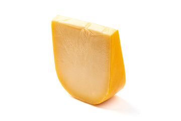 Traditional Dutch Gouda cheese, isolated on white background.