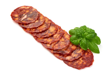 Spanish pork chorizo sausage slices, isolated on white background.