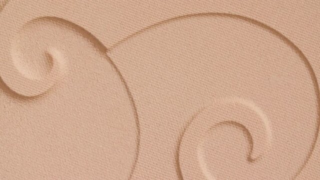 Make-up beige foundation with pattern, rotating. Cosmetic bb cream Close-up. Macro Shot. Beautiful Makeup concept. High quality 4k footage