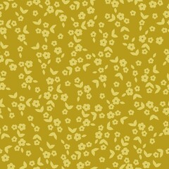 Beautiful vintage floral pattern. Small yellow flowers and leaves . Mustard background. Floral seamless background. An elegant template for fashionable prints.