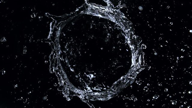 Super Slow Motion Shot of Rotating Water Ring Moving Towards Camera at 1000fps.
