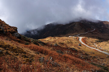 Nathang valley under clouds, Sikkim. Indian Chinese border at Himalayan mountains.