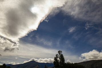 Multiple exposure composite of a masive cloud floating over the eastern Andes range of central Colombia near the colonial town of Villa de Leyva.