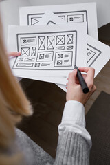 Woman designer create website design wireframe. Sketch, prototype, framework, layout future design...