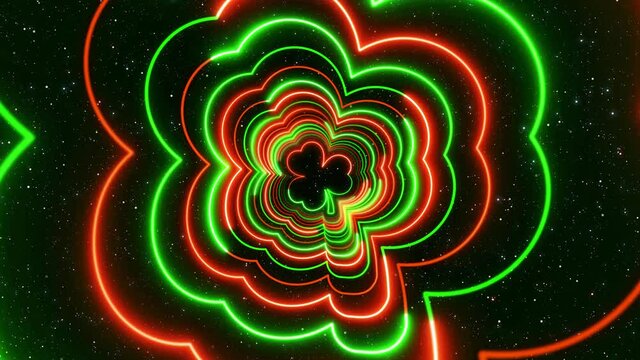 Abstract Festive Glowing Green And Orange Three Leaf Clovers Lines Neon Light Tunnel Rotating With Glitter Sparkle Stardust Seamless Loop Background
