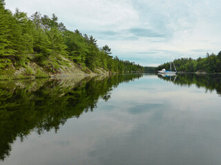 Fototapeta na wymiar Reflections in Shotgun Bay, The Massasauga Provincial Park, Georgian Bay Ontario Canada 