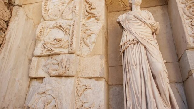 Arete statue in Ephesus, Turkey. Ancient statue at the facade of the Library of Celsus in Ephesus