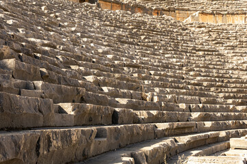 old stone steps - tribunes of an ancient theater