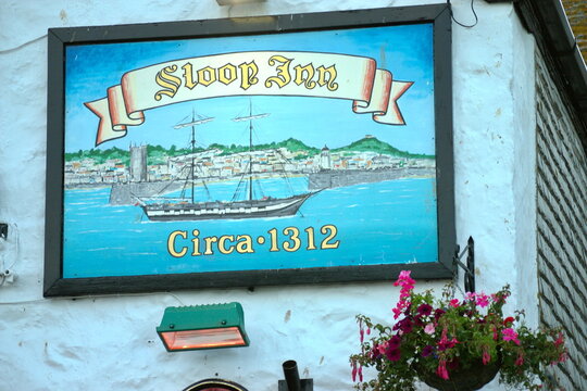 The Sloop Inn pub sign in St Ives, , Cornwall England UK