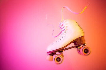 White roller skate on the pink and orange background - pop art poster.