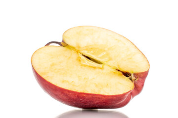 One half of a ripe red apple, close-up, isolated on white.