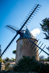 Old traditional windmill in Re island © daboost