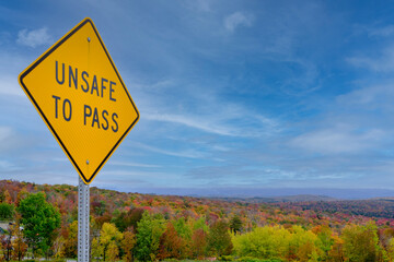 Unsafe to Pass Fall road sign