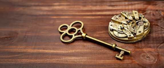 Escape room game banner, old gold vintage key with a watch