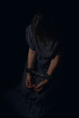 woman hands bound prisoner in room,hands bound