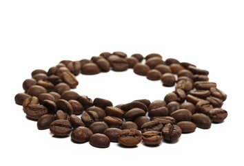 Pile coffee beans in shape circle isolated on white background and texture