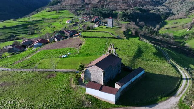 Aerial view of the Tower of Rubin de Celis and the church of San Facundo in the Town of Obeso in the Municipality of Rionansa. Cantabria, Spain, Europe