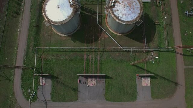 Aerial panorama overhead view of fuel and crude oil storage facilities. The oil and gas industry.