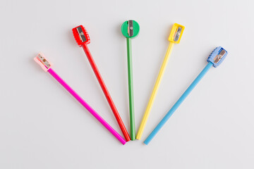 colored pencils and sharpeners