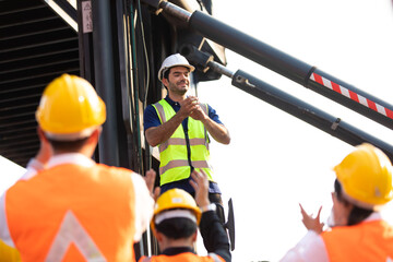 Hispanic man worker protest leader speaking with protester in workplace factory. Activist and leader