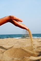 hand am strand sand rieselt
