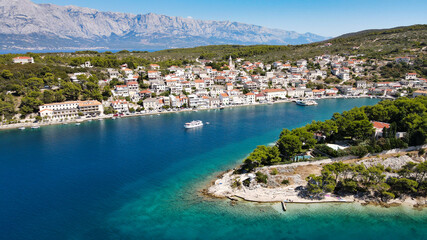 Fototapeta na wymiar Top view of the sea and the town of Povlia on Brac island in Croatia.