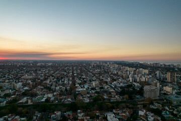 Naklejka na ściany i meble aerial shot of city on sunset 