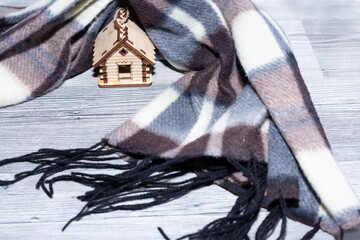 house wooden model and scarf