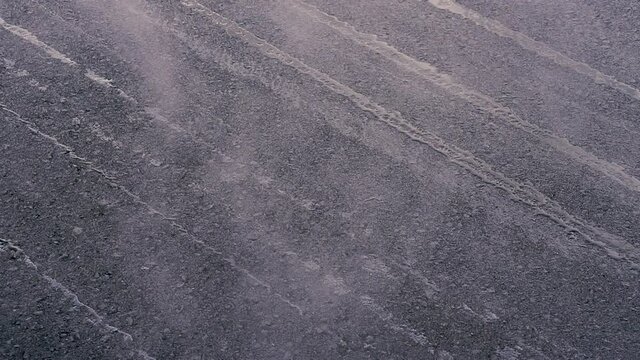 Asphalt. New asvalt from which steam comes.