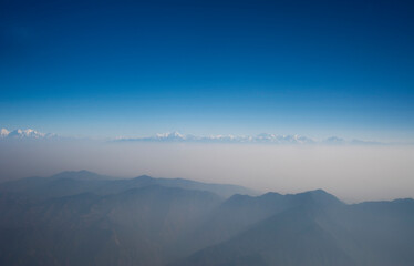 Naklejka na ściany i meble Smog in Kathmandu Valley and Himalayas Nepal