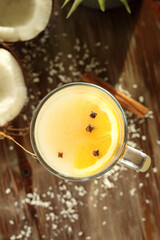 
Golden coconut milk with turmeric, cinnamon and orange.
  Warming up a healthy plant drink.