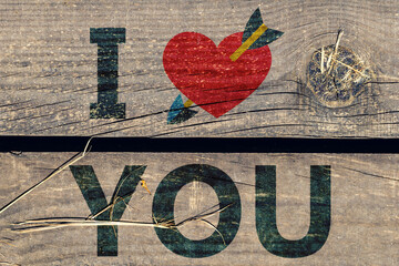 I love you text and heart with arrow on wooden boards