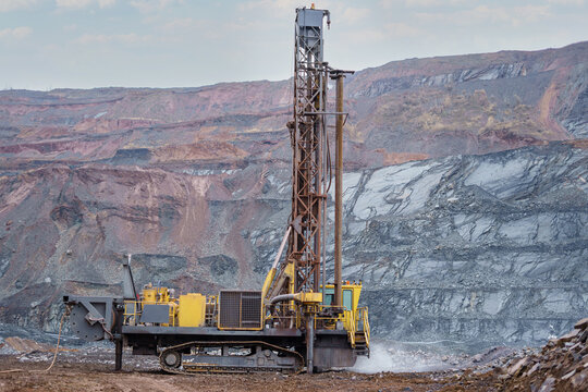 Part Of A Drilling Rig In A Mining Quarry. Preparation Of Boreholes For Laying Explosives, Ore Mining Technology In The Quarry.