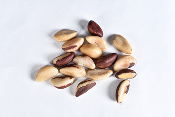 Brazil nuts on the white table, typical Brazilian fruit