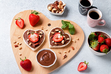 Breakfast for two, Valentines day food for couple in love with chocolate toasts and strawberry